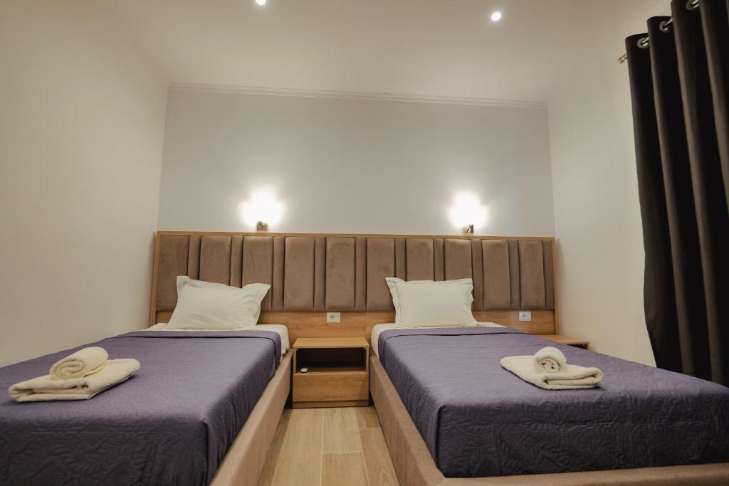 Una cama o camas en una habitación de Casa Del Mar