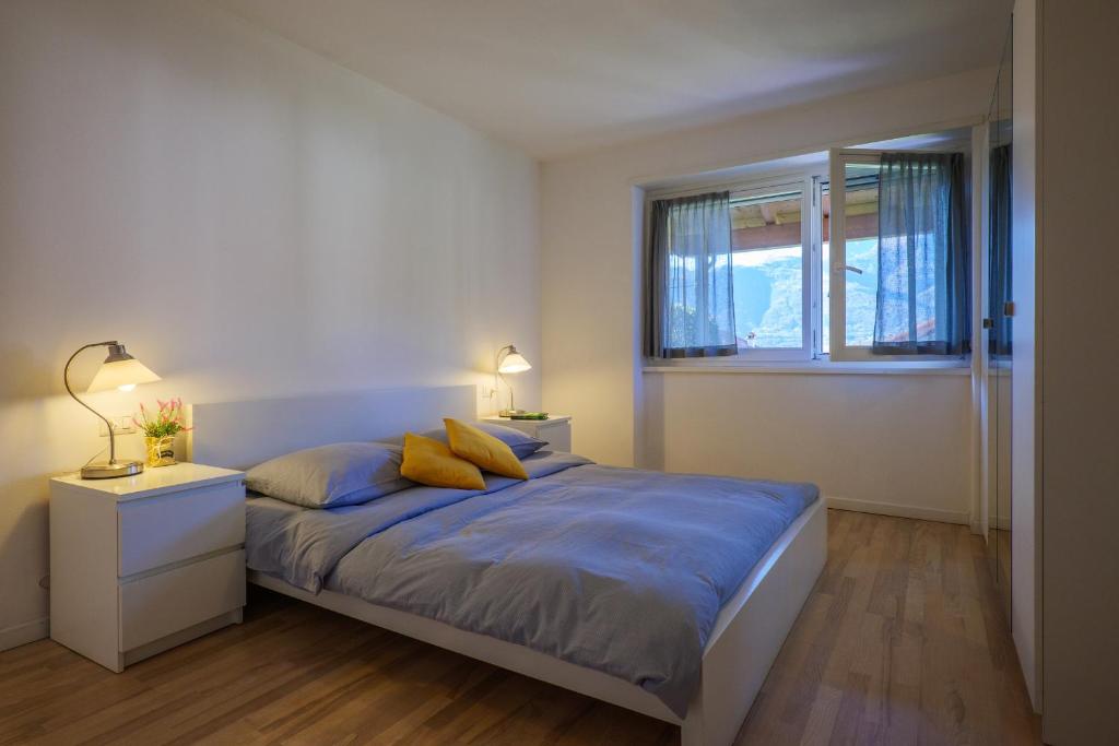 Postel nebo postele na pokoji v ubytování Residence Girasole Casa Gialla