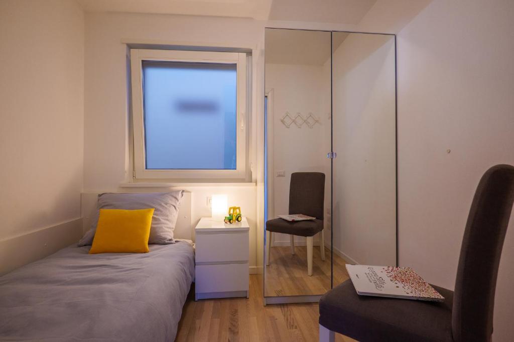 Postel nebo postele na pokoji v ubytování Residence Girasole Casa Gialla
