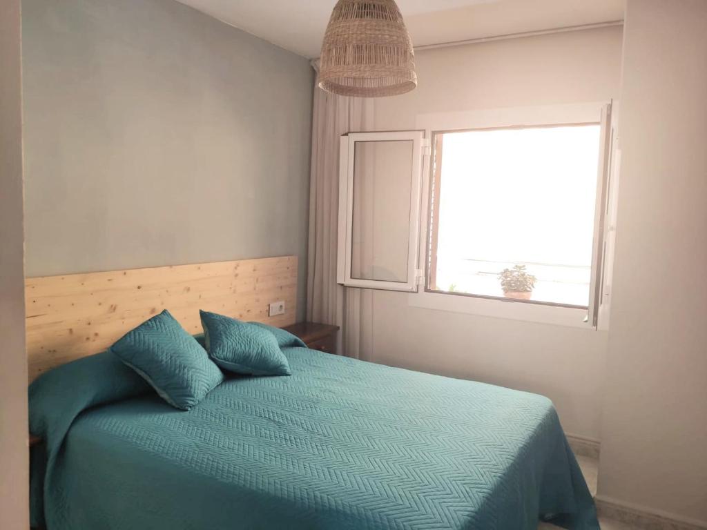 Postel nebo postele na pokoji v ubytování Apartamento a 150 metros de la playa en la Fosca