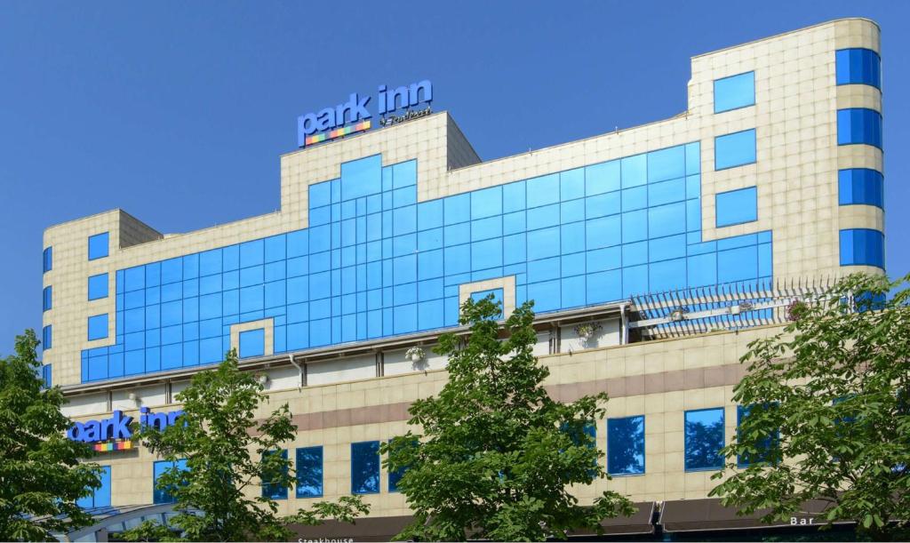 a building with a sign on top of it at Park Inn by Radisson Odintsovo in Odintsovo