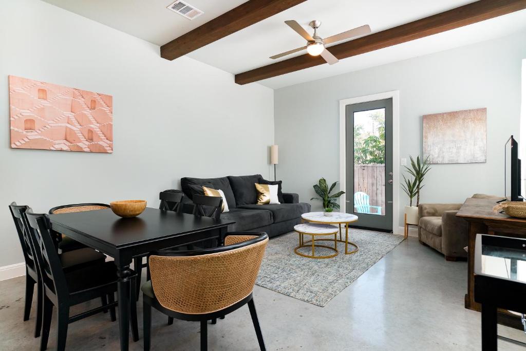 a living room with a black table and a couch at Casa Dolce Vita by the Alamodome in San Antonio