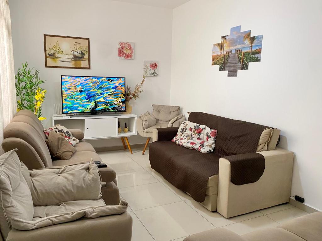 TV a/nebo společenská místnost v ubytování Apartamento 100 metros da praia das Astúrias