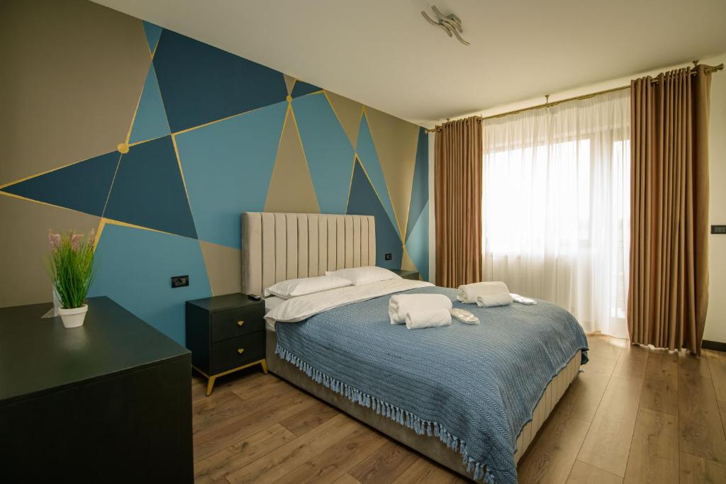 Postel nebo postele na pokoji v ubytování Casa Lucan Brașov