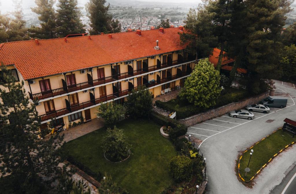 an overhead view of a building with a courtyard at Milionis Forest Hotel in Grevena