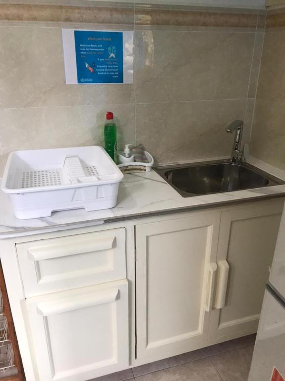 Kuchyň nebo kuchyňský kout v ubytování Acquario Guesthouse