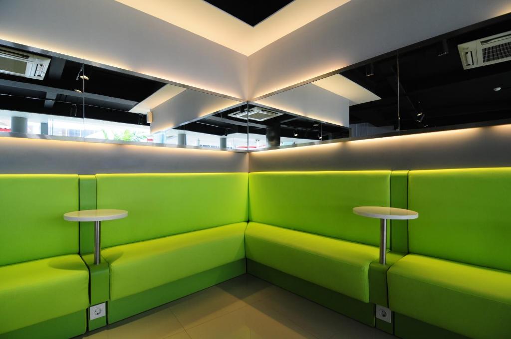 Un lugar para sentarse en Swift Inn Aeropolis Airport