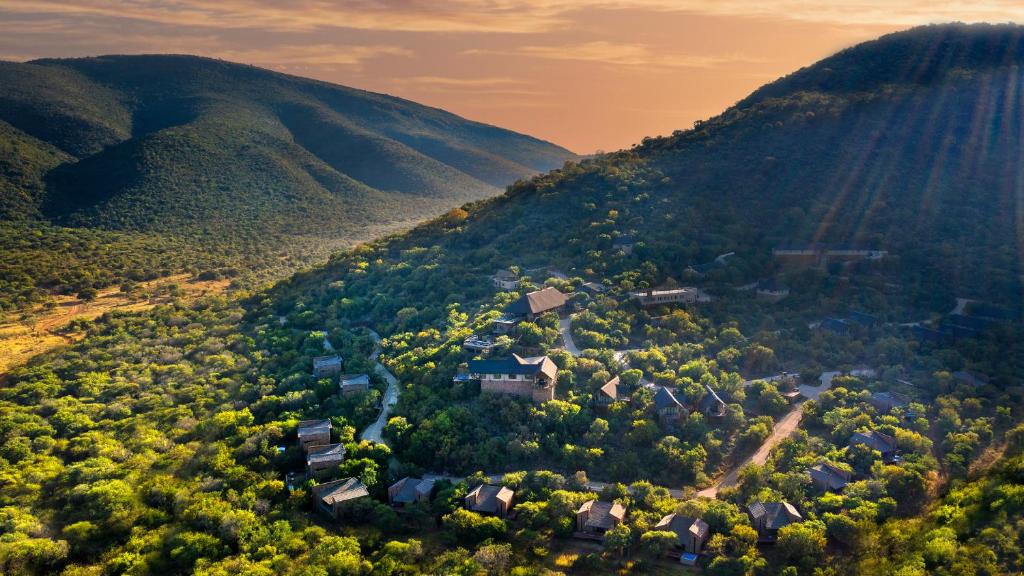 an aerial view of a village in the mountains at Babohi at Qwabi Private Game Reserve by NEWMARK in Bela-Bela
