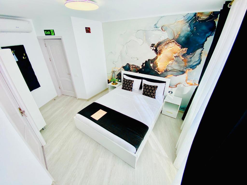 Postel nebo postele na pokoji v ubytování IANIS Rooms