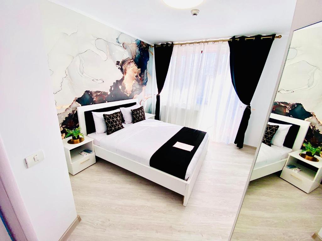 Postel nebo postele na pokoji v ubytování IANIS Rooms