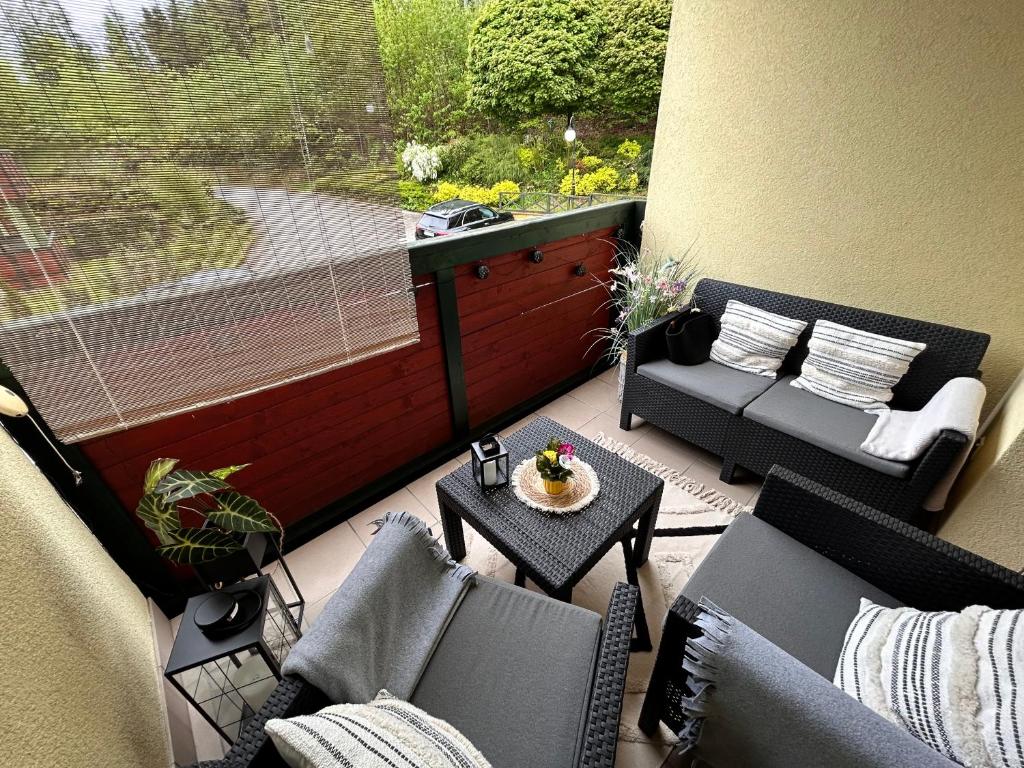 Posedenie v ubytovaní Apartament Klaudia Polanica-Zdrój