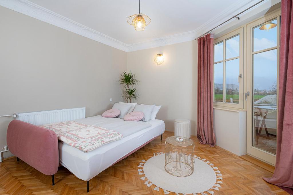 Postel nebo postele na pokoji v ubytování Villa Rory