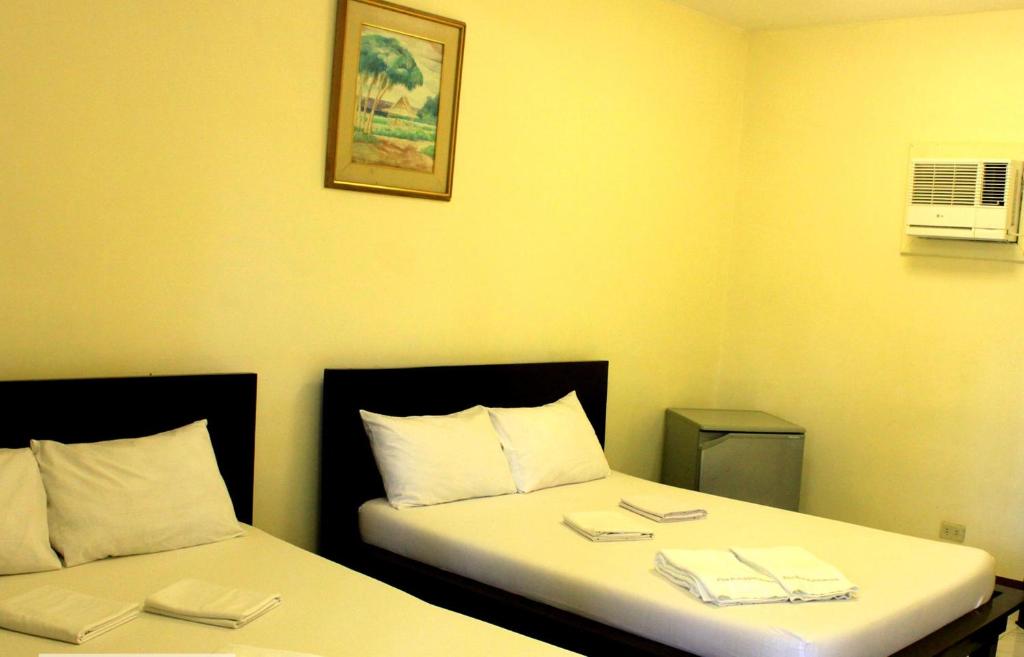 Postel nebo postele na pokoji v ubytování Bakasyunan Resort and Conference Center - Zambales