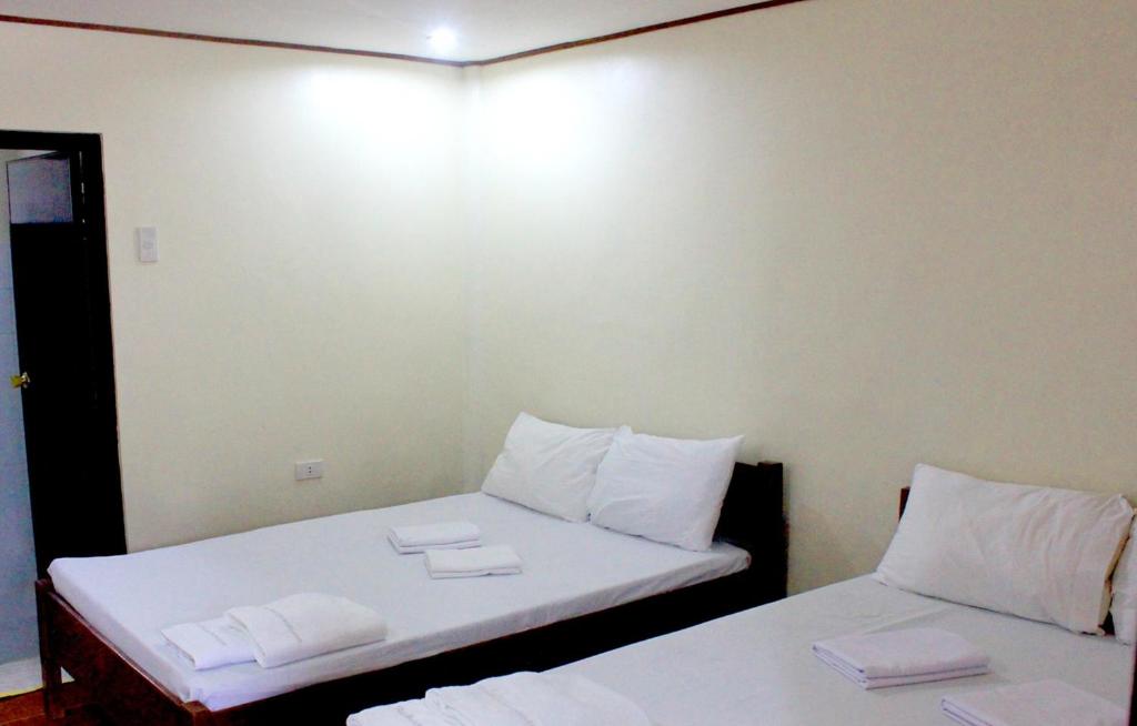 Postel nebo postele na pokoji v ubytování Bakasyunan Resort and Conference Center - Zambales