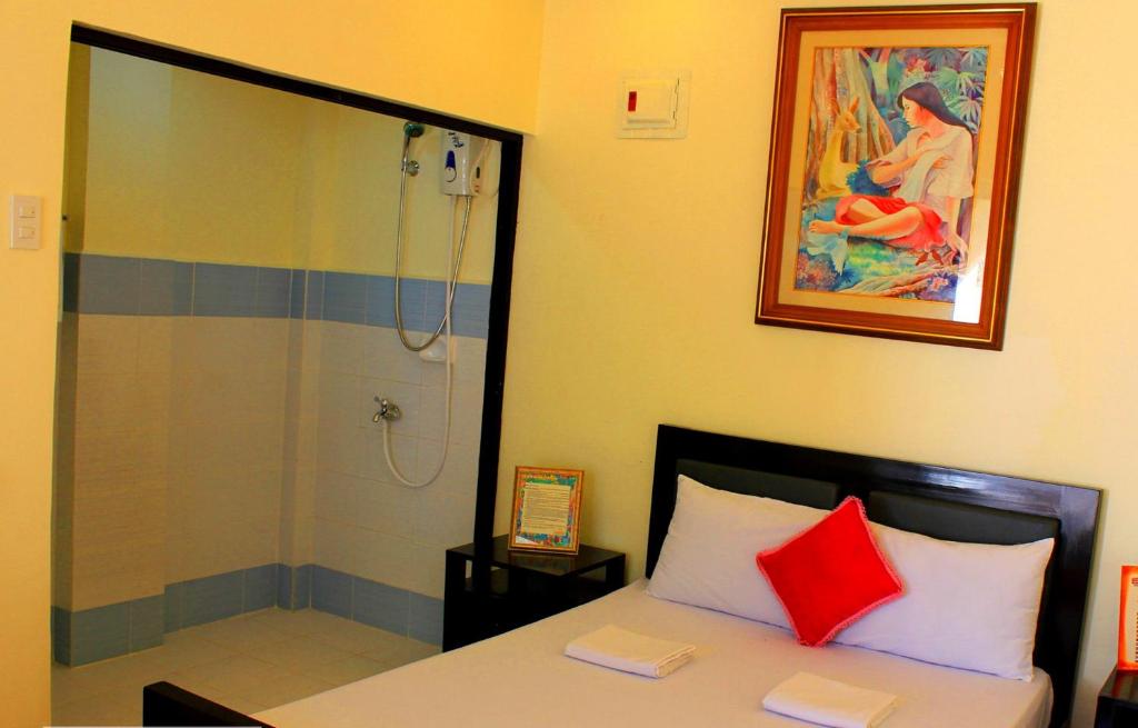 Postel nebo postele na pokoji v ubytování Bakasyunan Resort and Conference Center - Zambales