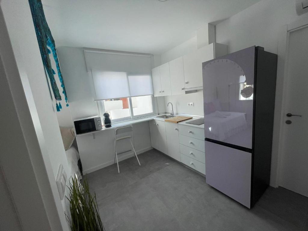 Kuchyň nebo kuchyňský kout v ubytování Levante by Mintaka Homes