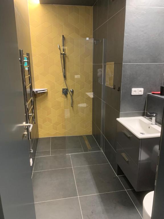Koupelna v ubytování Apartmány na Plešivci