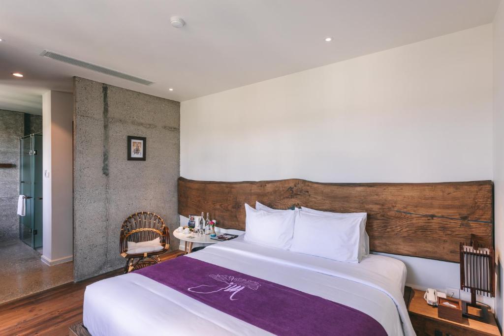 Giường trong phòng chung tại JM Boutique Hotel
