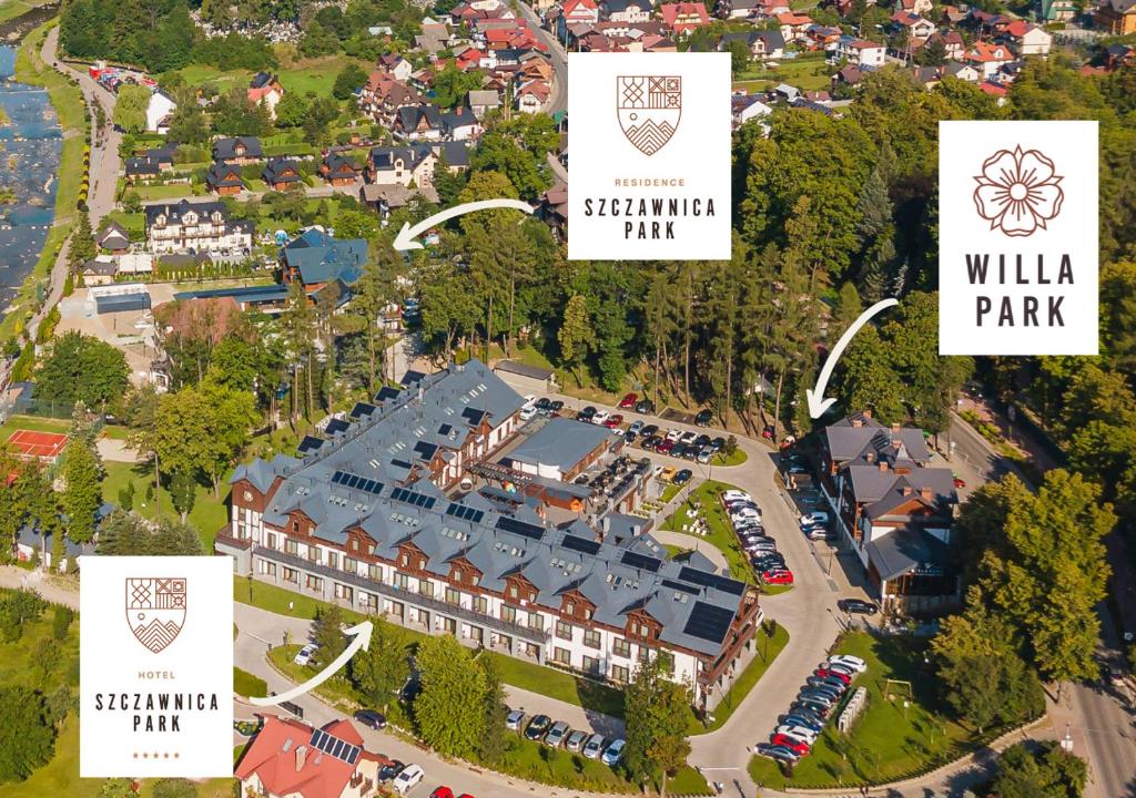 eine Luftaufnahme eines Gebäudes mit einem Park in der Unterkunft Szczawnica Park Resort & Spa in Szczawnica