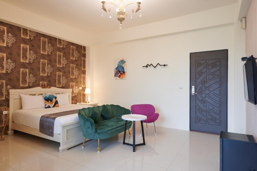 Postel nebo postele na pokoji v ubytování Avenue B&B