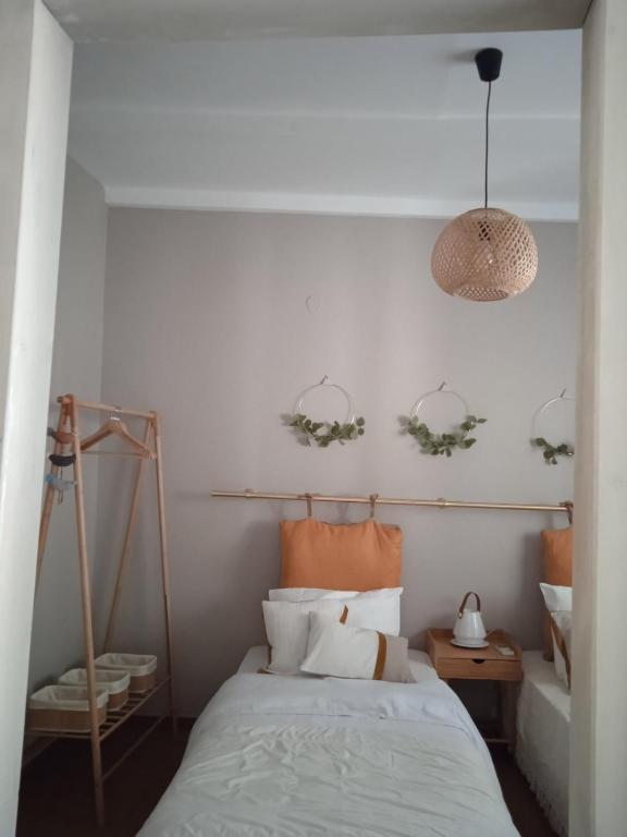 Postel nebo postele na pokoji v ubytování Paul Seafront House