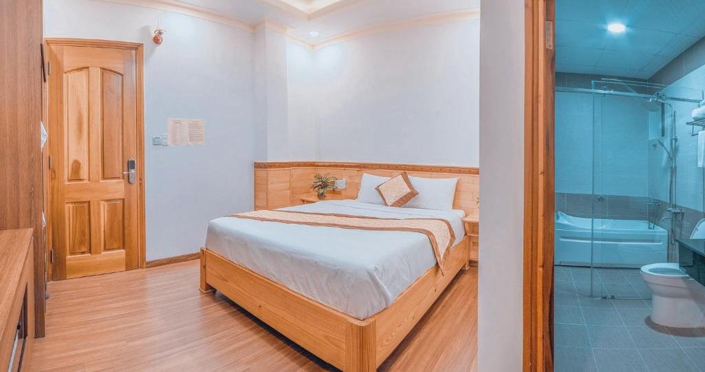 Giường trong phòng chung tại Hoàng Yến Villa Dalat