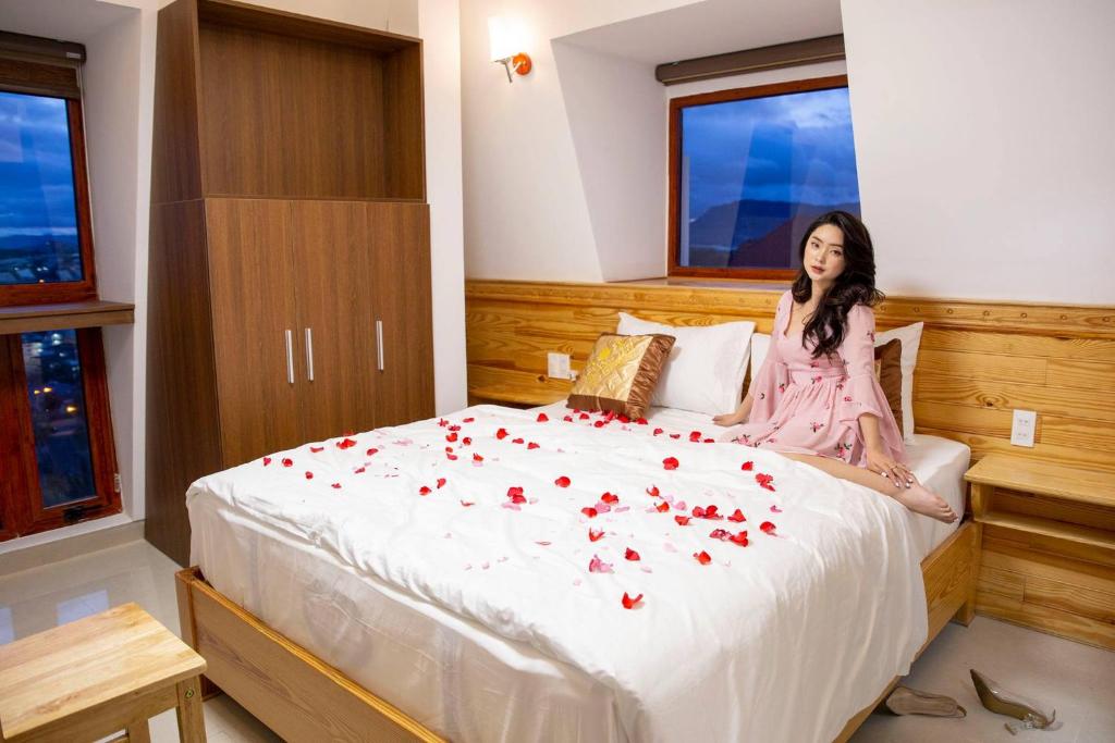 Giường trong phòng chung tại Hoàng Yến Villa Dalat