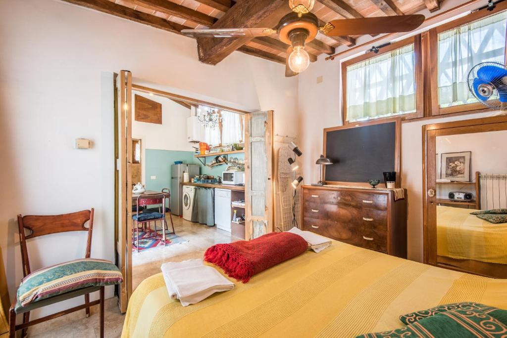 A bed or beds in a room at Il Botteghino