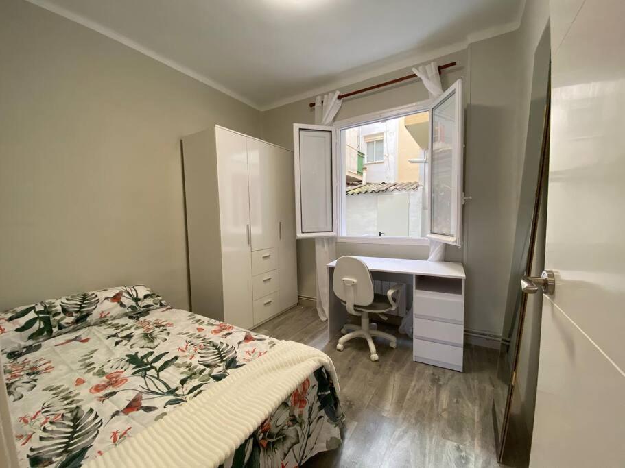 Posteľ alebo postele v izbe v ubytovaní Apartamento acogedor en Logroño