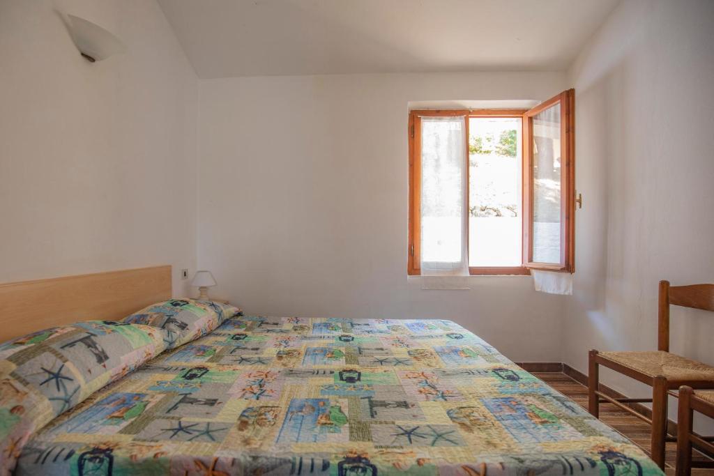 Postel nebo postele na pokoji v ubytování Residenza Miramare - HelloElba