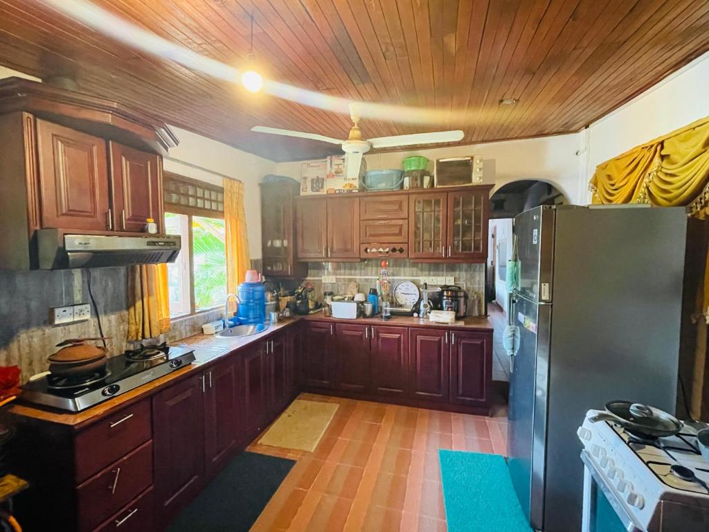 Kuchyň nebo kuchyňský kout v ubytování Mangala Lodge