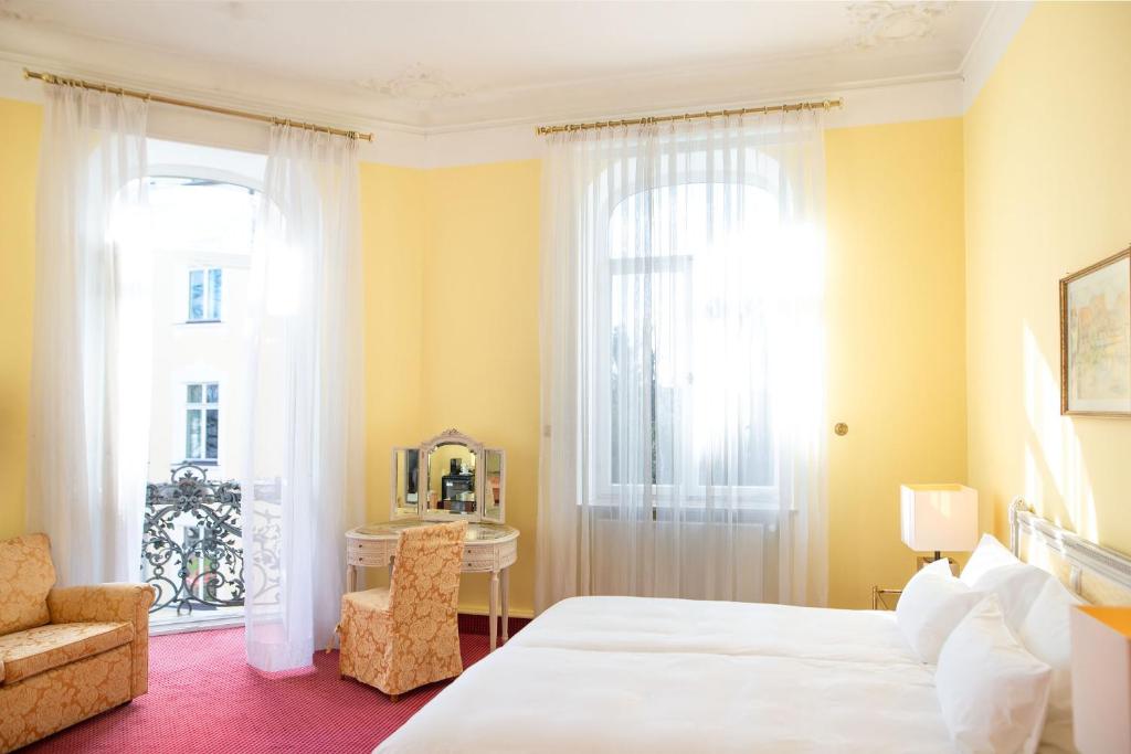 Cama ou camas em um quarto em Hotel Bamberger Hof Bellevue