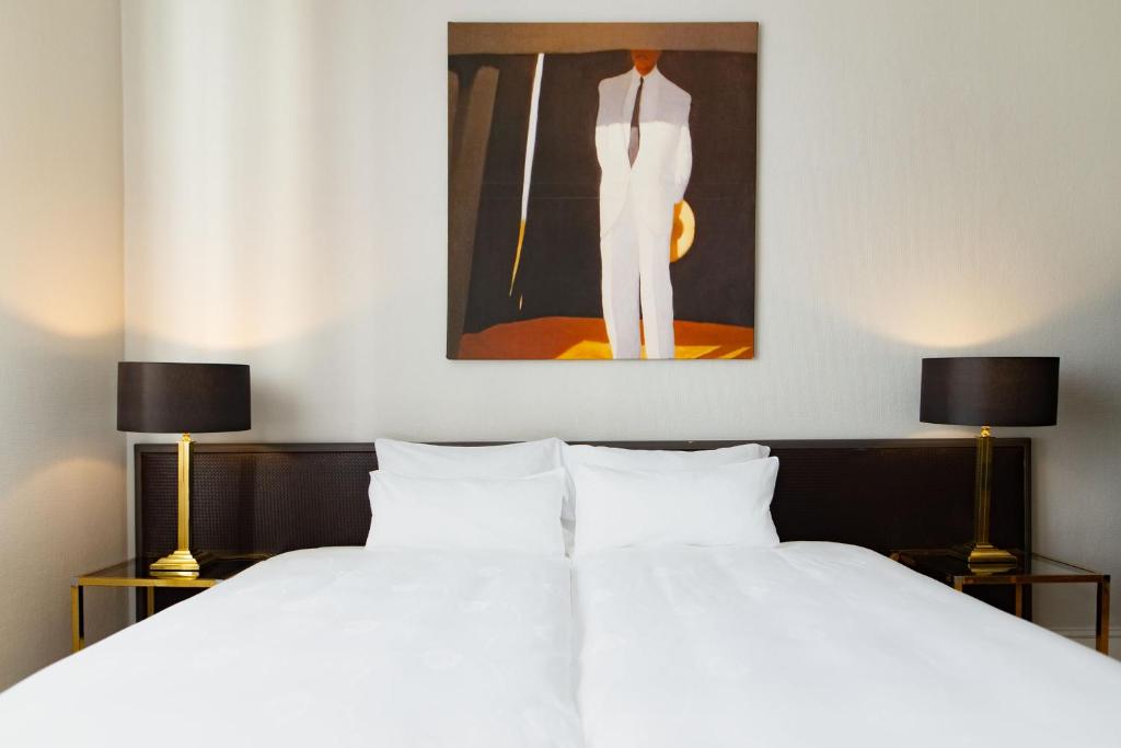 Cama ou camas em um quarto em Hotel Bamberger Hof Bellevue