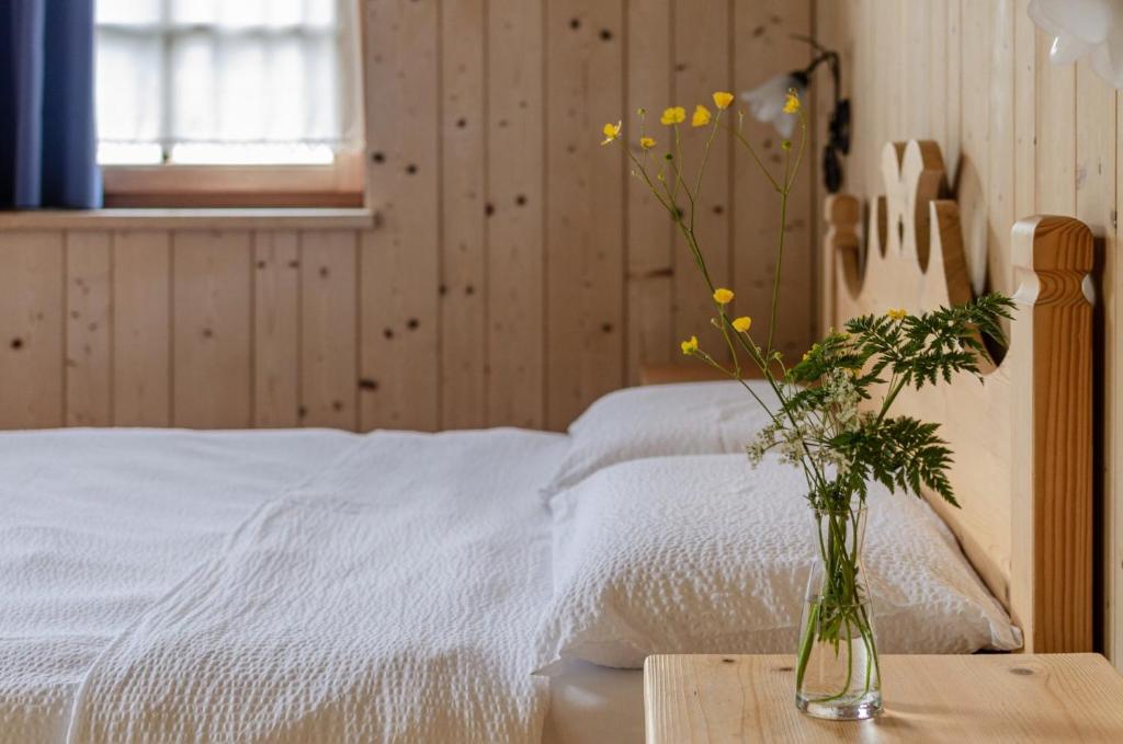 Postel nebo postele na pokoji v ubytování Hotel Chalet val di Rabbi