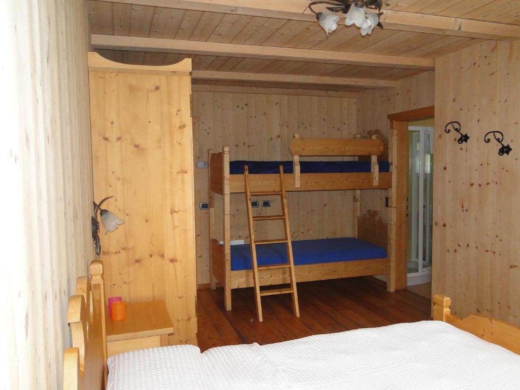Postel nebo postele na pokoji v ubytování Hotel Chalet val di Rabbi