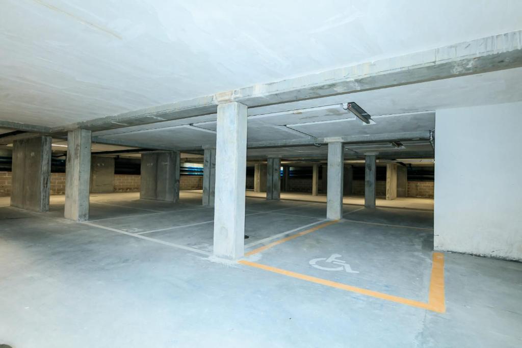 an empty parking lot in a parking garage at Residence San Francesco in Tirrenia