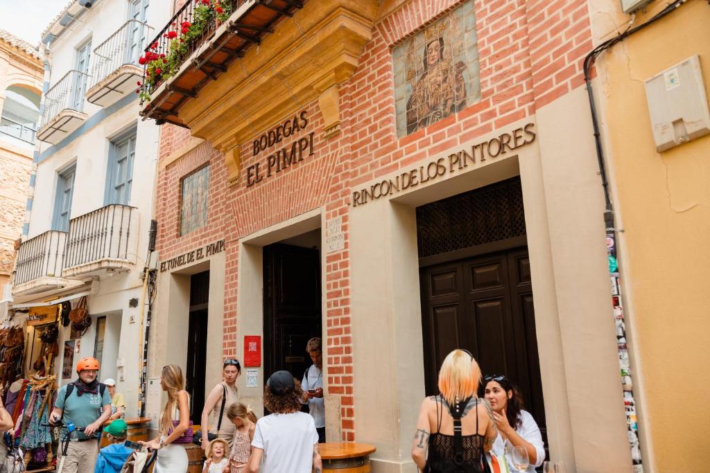 Hostia v ubytovaní In the historic center of Malaga, very close to the beach and the AVE train station, with private parking