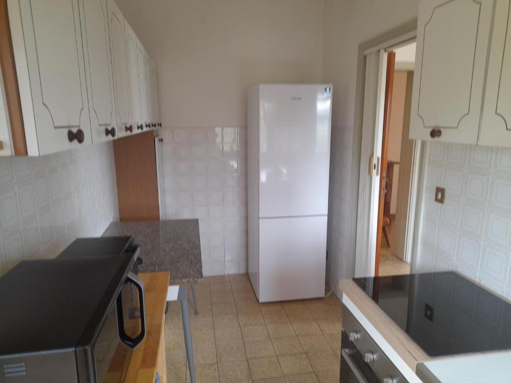 Kuchyňa alebo kuchynka v ubytovaní CASA CAMELIA