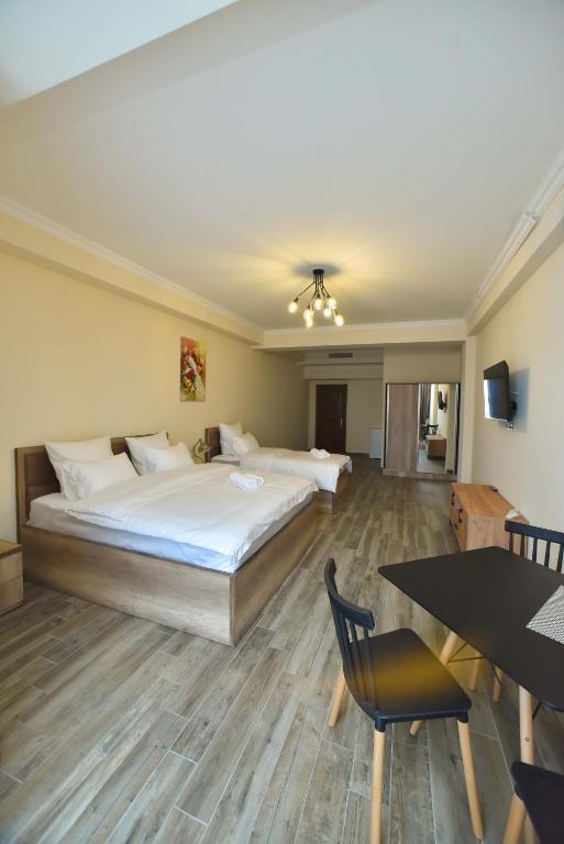 Postel nebo postele na pokoji v ubytování Altunyan Hotel