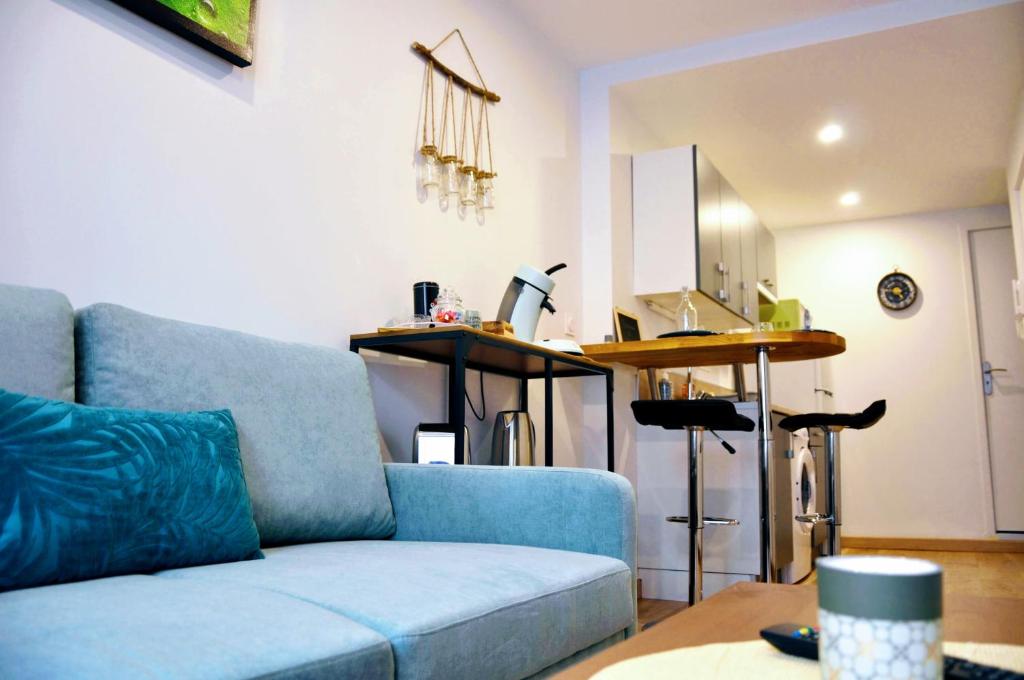 Posezení v ubytování Dormir à Brioude - appartement 'esprit zen'
