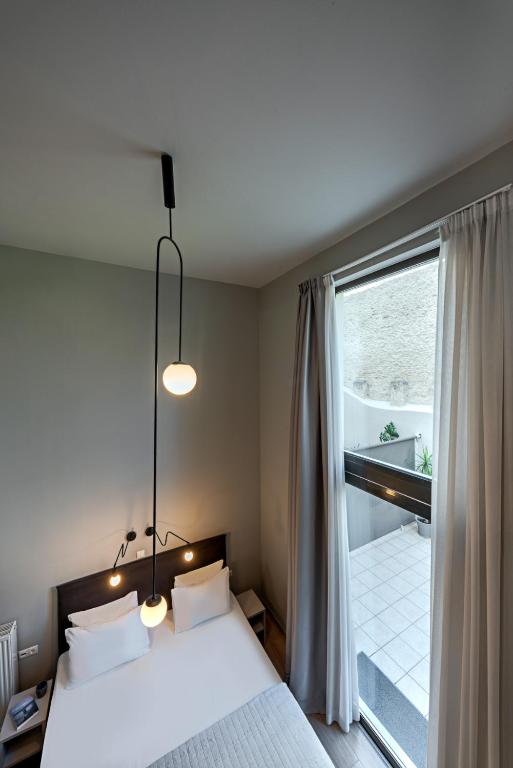 Posteľ alebo postele v izbe v ubytovaní BED in Athens