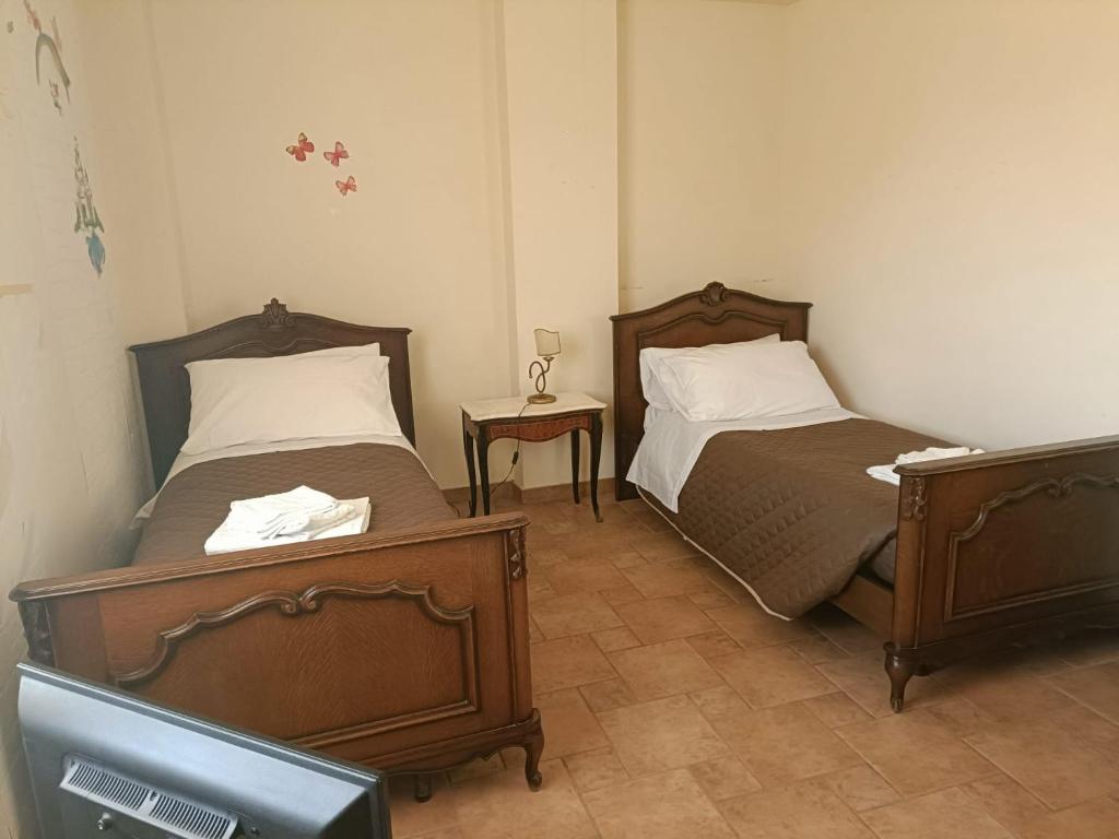 Ein Bett oder Betten in einem Zimmer der Unterkunft Serendipity