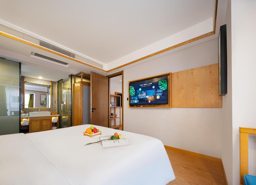TV a/nebo společenská místnost v ubytování Xiangxi's Lovely - Yangyun Hotel