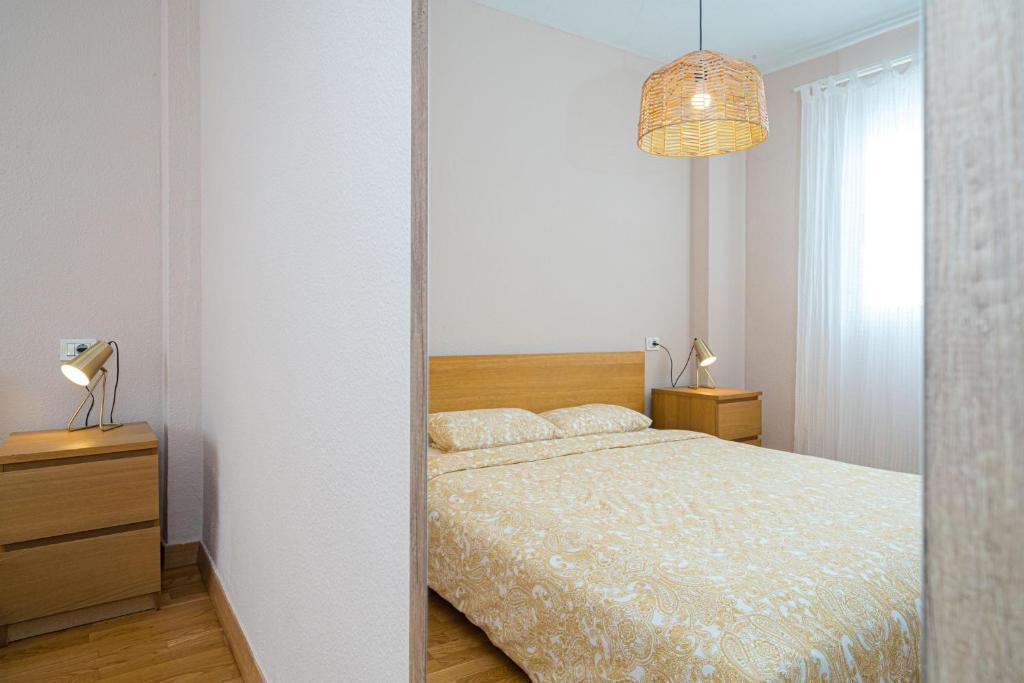 Postel nebo postele na pokoji v ubytování Casa Terra: Apartment 50 meters from the beach