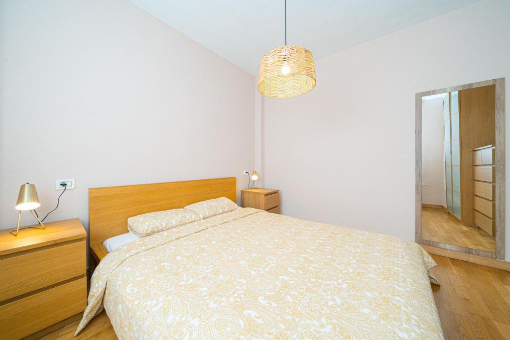 Postel nebo postele na pokoji v ubytování Casa Terra: Apartment 50 meters from the beach