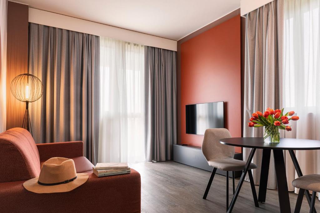 Uma televisão e/ou sistema de entretenimento em Quark Hotel Milano