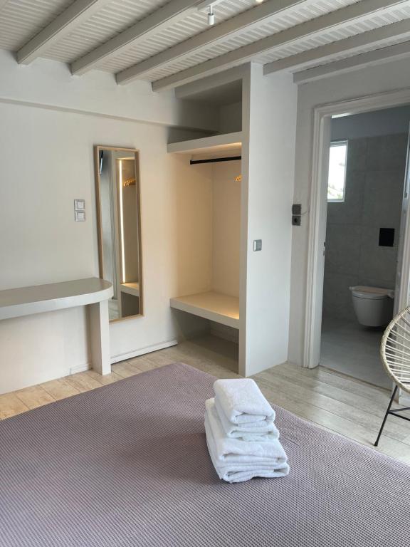 Posteľ alebo postele v izbe v ubytovaní Rania Apartments Sea View
