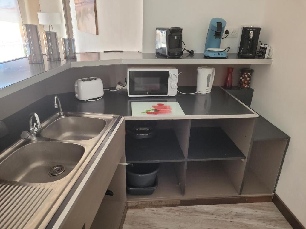 Kuchyňa alebo kuchynka v ubytovaní Maison Princesse