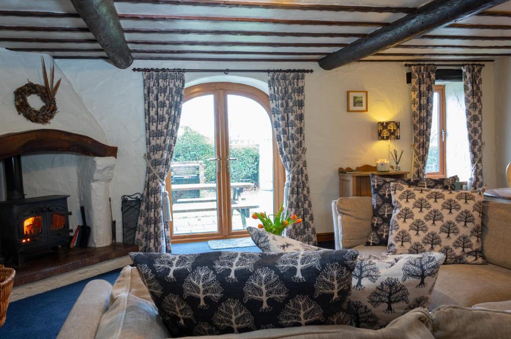 Ένα ή περισσότερα κρεβάτια σε δωμάτιο στο Gelt Cottage, Castle Carrock, Nr Carlisle