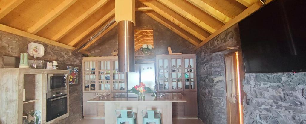 Kuchyň nebo kuchyňský kout v ubytování Casa dos Gatos